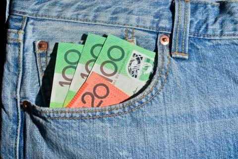 Australian One hundred dollars notes twenty dollar front pocket pair jeans. Stock Photos