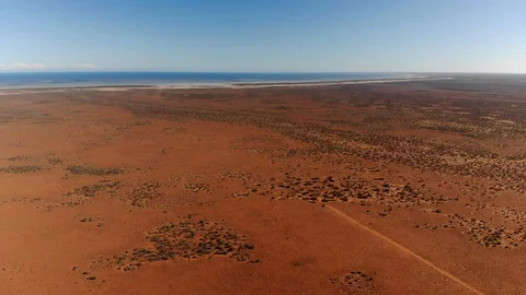 Australian Red Desert meets the Sea. Outback in Western Australia (aerial) Stock Footage