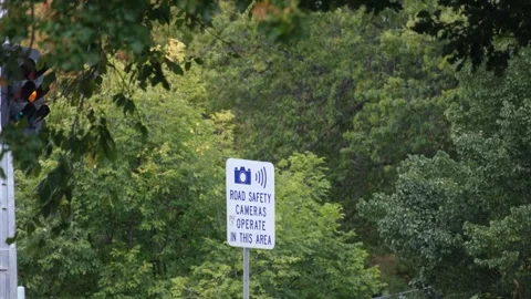 Australian road safety camera warning sign in Melbourne, Australia Vídeos de archivo 336034665