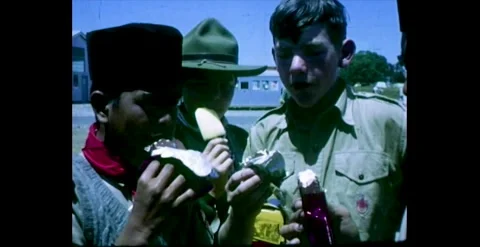 Australian Scouts Marching and Sharing Meals  - Archive Footage: 1965 Stock Footage 263013413