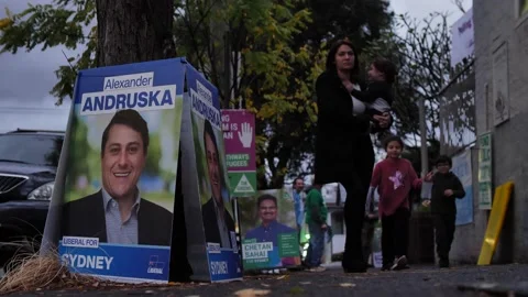 Australians leave voting centre slow motion General election 2022 4K Video stock 195083333