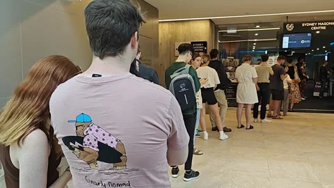 AUSTRALIANS QUEUING TO VOTE ON REFERENDUM DAY OCTOBER 2023 4K Stock Footage 252951086