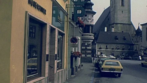 Austria 1978: cars parked in a small town Stock Footage