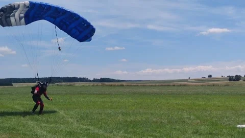 Austria, 20. August 2025 - parachute landing, skydiver parachute 스톡 동영상 315879596