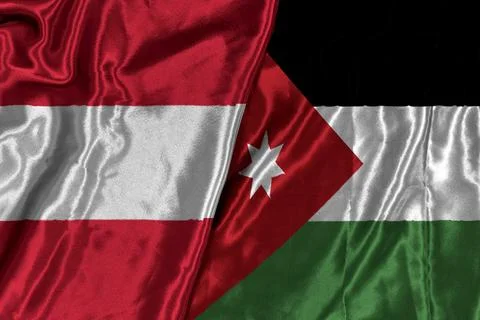 Austria And Jordan Flags Draped Together On Silk Fabric Representing Diplomacy A Stock Photos