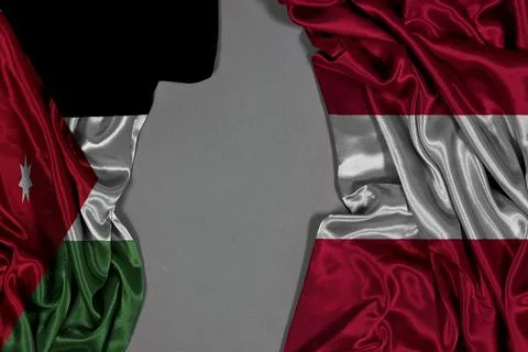 Austria And Jordan Flags Draped Together On Silk Fabric Representing Diplomacy A Stock Photos