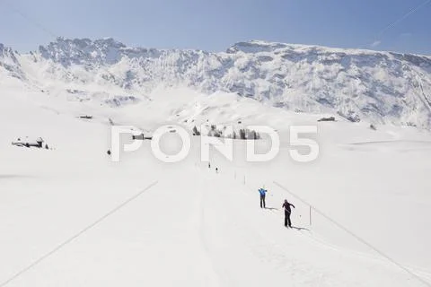 Austria, Arlberg, Man Skiing Downhill