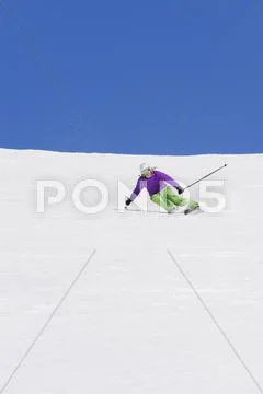 Austria, Arlberg, Two Men Skiing Downhill