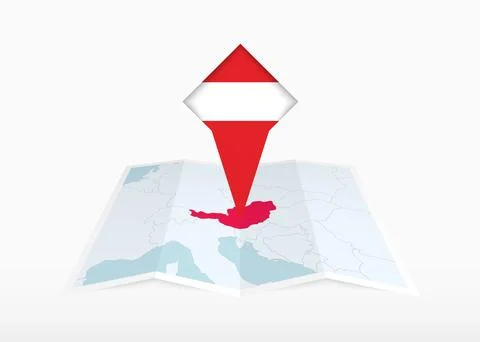 Austria is depicted on a folded paper map and pinned location marker with f.. Stock Illustration