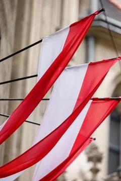 Austria Flag waving on a pole Stock Photos
