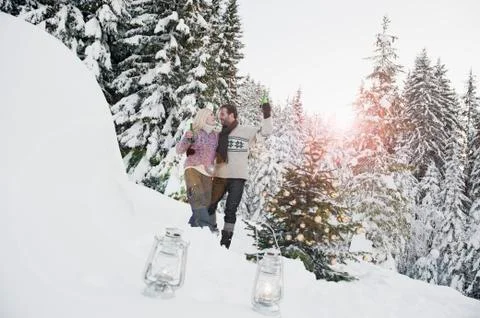 Austria, Salzburg County, Couple celebrating christmas in snowy landscape Stock Photos