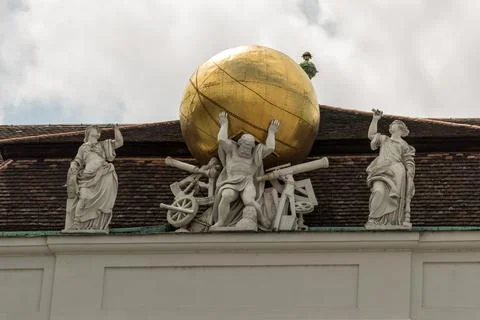 Austria, Vienna, Statue of Atlas on the roof of the national library Stock Photos