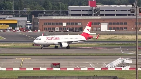 Austrian Airlines Turning left to right at International Airport Stock Footage 158695337