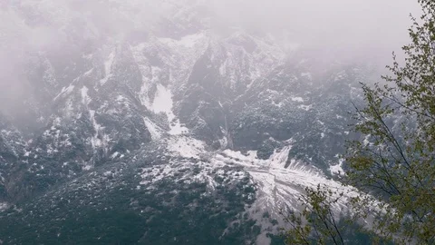 Austrian Alps mountains with snow and clouds Video stock 74921977