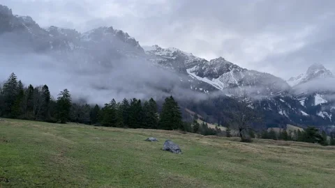 Austrian Alps in spring in mountains in fog Stock Footage 196072892