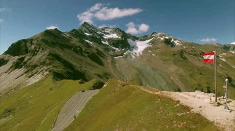 Austrian flag on the top of Grossglockner road Stock Footage 68020307