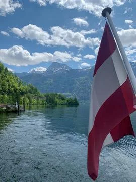 Austrian flag in Upper Austria region, Hallstatt, Austrian Alps, Austria Fotos de archivo