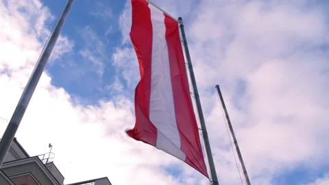 Austrian flag waving in strong wind Stock Footage 147279430