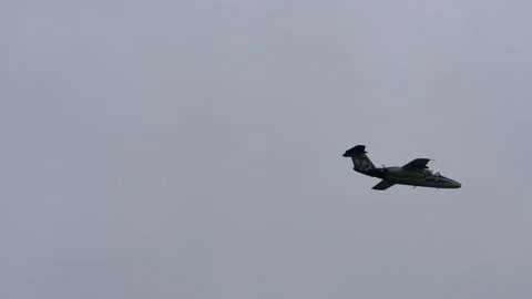 Austrian military jet plane performs stunts in flight Stock Footage 159752742