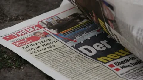 Austrian Newspaper on the floor 2 Stock Footage 22241853