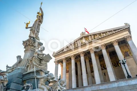 Austrian parliament building with Athena statue Stock Photos