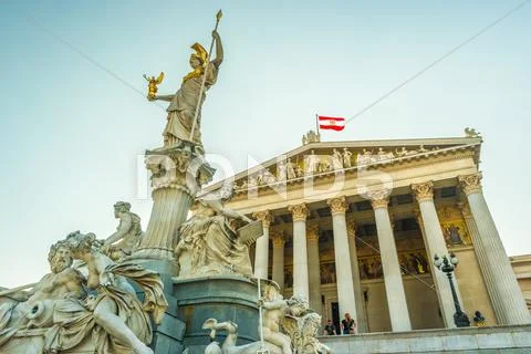 Austrian parliament building with Athena statue Stock Photos