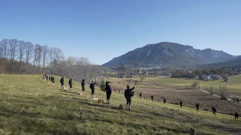 Austrian Shooting Team fires Black powder guns together in Austrian Alps Stock Footage 120980417