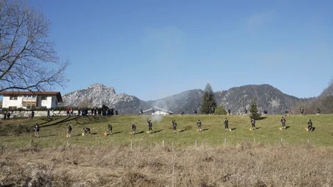 Austrian Shooting Team fires Black powder guns in pattern in Austrian Alps Stock Footage 120981161
