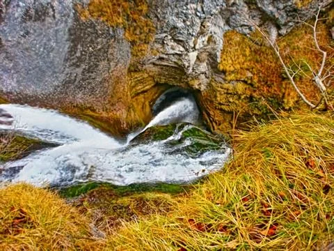 Austrian waterfall into cave Stock Photos