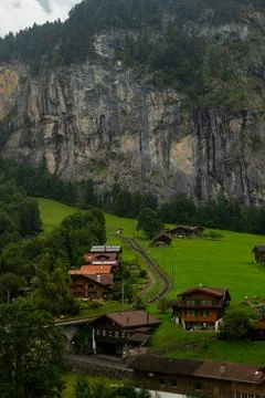 Authentic Alpine Railway and Cliffs Scenic Photo Stock Photos