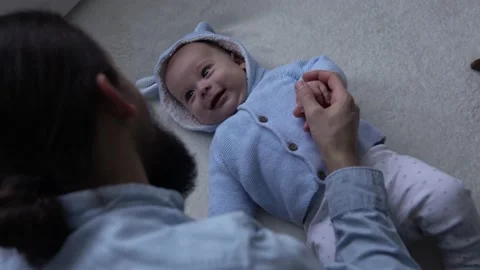 Authentic Bearded Long-haired Young Neo Father And Newborn Baby Looking Each Stock Footage 167952065