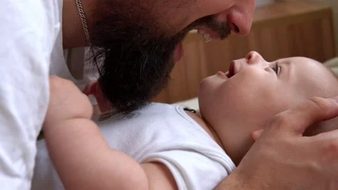 Authentic Bearded Long-haired Young Neo Father And Newborn Baby Looking Each Stock-Footage 199666411