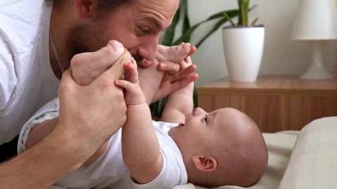 Authentic Bearded Long-haired Young Neo Father And Newborn Baby Looking Each Stock Footage 200850982