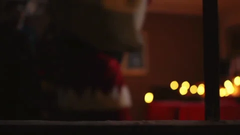 Authentic blurred santa clause leaving christmas gifts near christmas tree Stock Footage 141403458