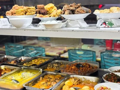 Authentic Buffet Display with Various Indonesian Dishes Traditional Restaurant Stock Photos