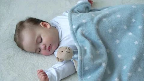 Authentic close up of cute caucasian little infant chubby baby girl sleep Stock-Footage 150186830