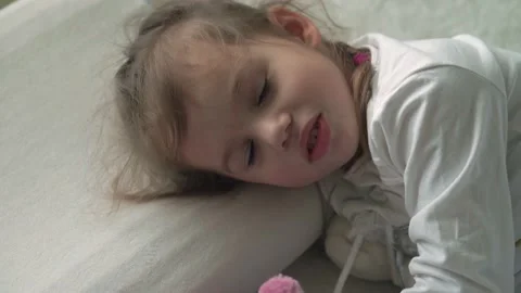 Authentic close up of cute caucasian little preschool toddler child girl so Stock Footage 150237449