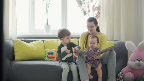 Authentic close up cute neo caucasian spectacled mom with 2 children boy and Stock Footage 150186637