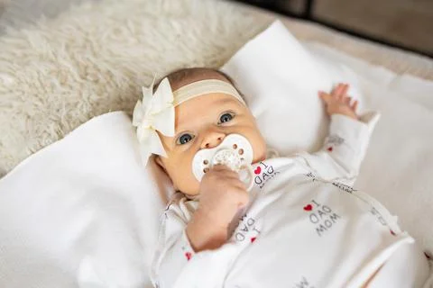Authentic Close Up Footage of Crying Newborn Baby Lying Stock Photos