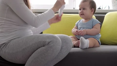 Authentic close up shot of young neo caucasian mother keeping in arms and Stock Footage 149275208