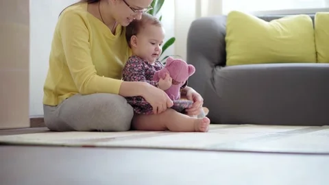 Authentic close up shot of young neo caucasian mother keeping in arms and Stock Footage 149441413