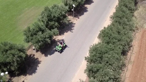 Authentic Couple Quad Biking in Greece Stock Footage 77300925