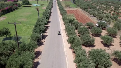 Authentic Couple Quadbiking in Greece Stock Footage 77300952