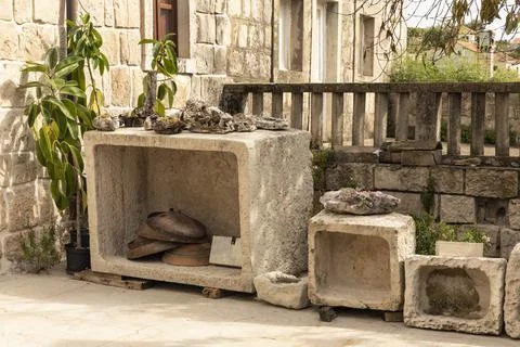 Authentic decorative objects outside in the garden in Konavle, Croatia Stock Photos