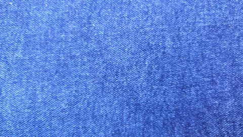 Authentic denim surface, denim fabric texture. Denim material, blue denim 库存影片 347820301