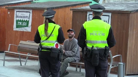 Authentic emotion homeless man talking with police Stock Footage 51484330