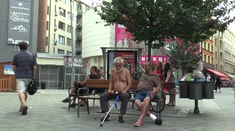Authentic emotion homeless men on a bench Stock Footage 55196828