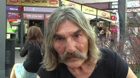 Authentic face emotion senior man homeless in city Stock Footage 55013872