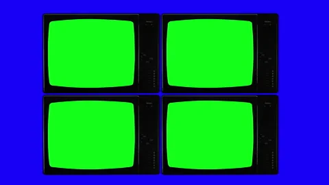 Authentic four TV turning on Green Screen over blue Background. Stock Footage 150129694