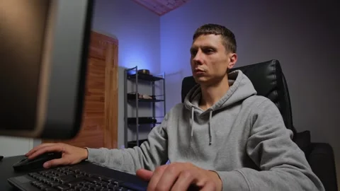 Authentic freelance work from home. Man working on laptop at modern desk Video stock 315407471